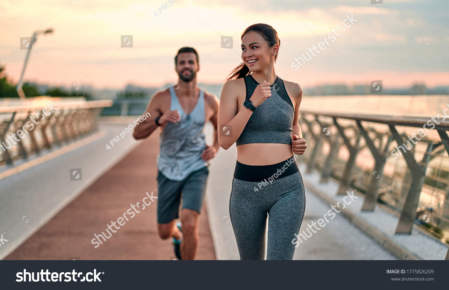 stock-photo-couple-doing-sport-together-on-the-street-morning-run-1775826209